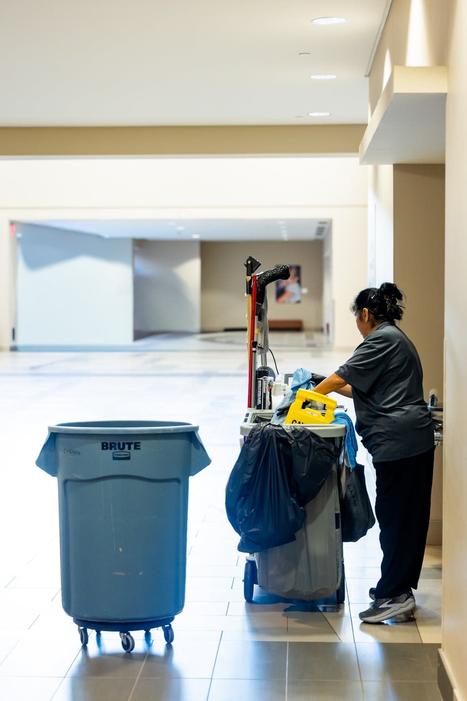 Cleaning team logging hours at a client site