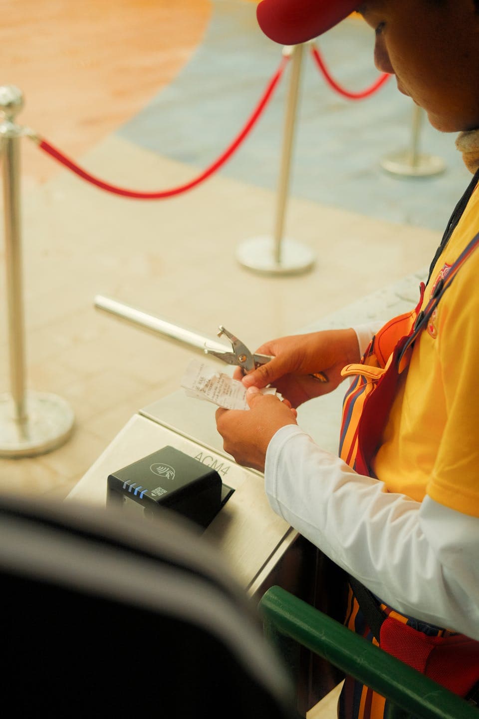 Event staff checking schedules before a venue opens