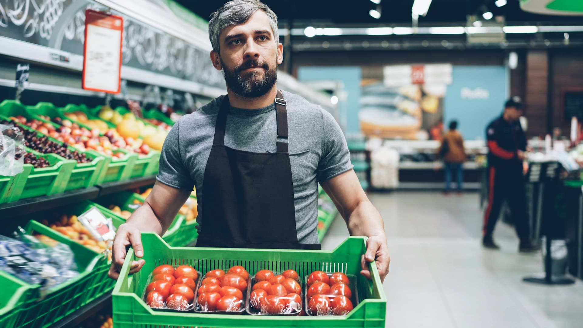 Retail employees managing shifts on the shop floor
